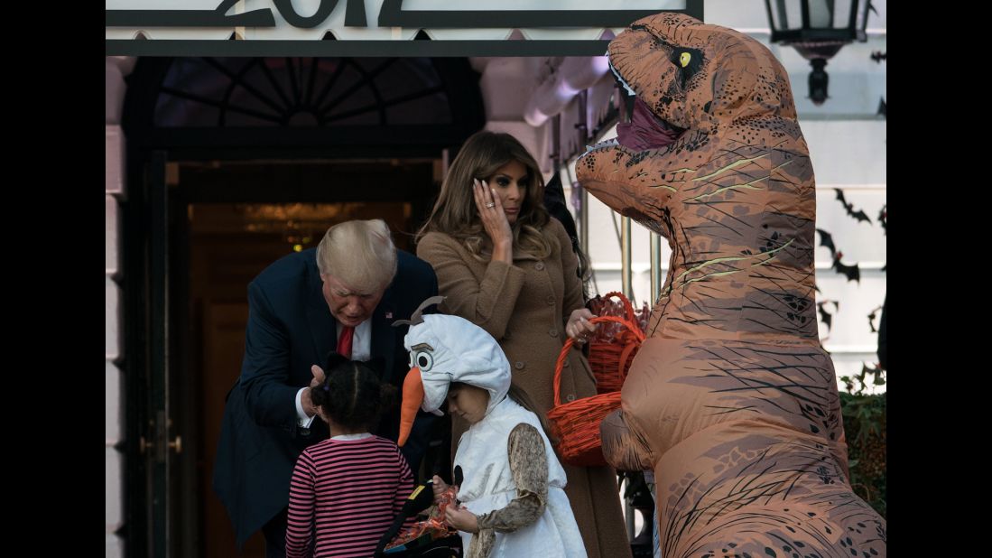 The Trumps hand out candy to children during a White House <a href="https://www.cnn.com/videos/politics/2017/10/31/trump-white-house-halloween-erin-moos-pkg.cnn" target="_blank">Halloween event.</a>