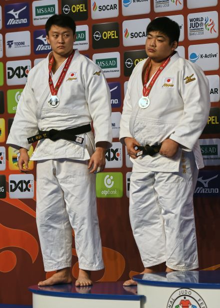 Japanese judoka Hisayoshi Harasawa (L) and Takeshi Ojitani (R) contested the heavyweight final at the inaugural Dusseldrof Grand Slam, but neither man won.