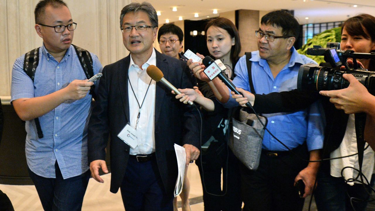 US Special Representative for North Korea Policy Joseph Yun (2nd L) is surrounded by the media as he walks out for his lunch break during the Northeast Asia Cooperation Dialogue (NEACD) in Singapore on July 11, 2017. 
Yun is in Singapore to attend the Northeast Asia Cooperation Dialogue (NEACD) from July 11 to 13. / AFP PHOTO / Roslan RAHMAN        (Photo credit should read ROSLAN RAHMAN/AFP/Getty Images)