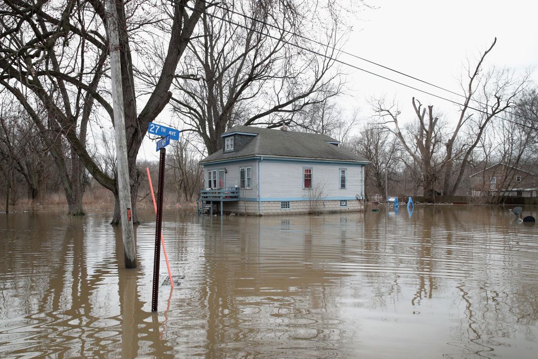 Floodwaters surround a home on February 22 in Lake Station, Indiana.