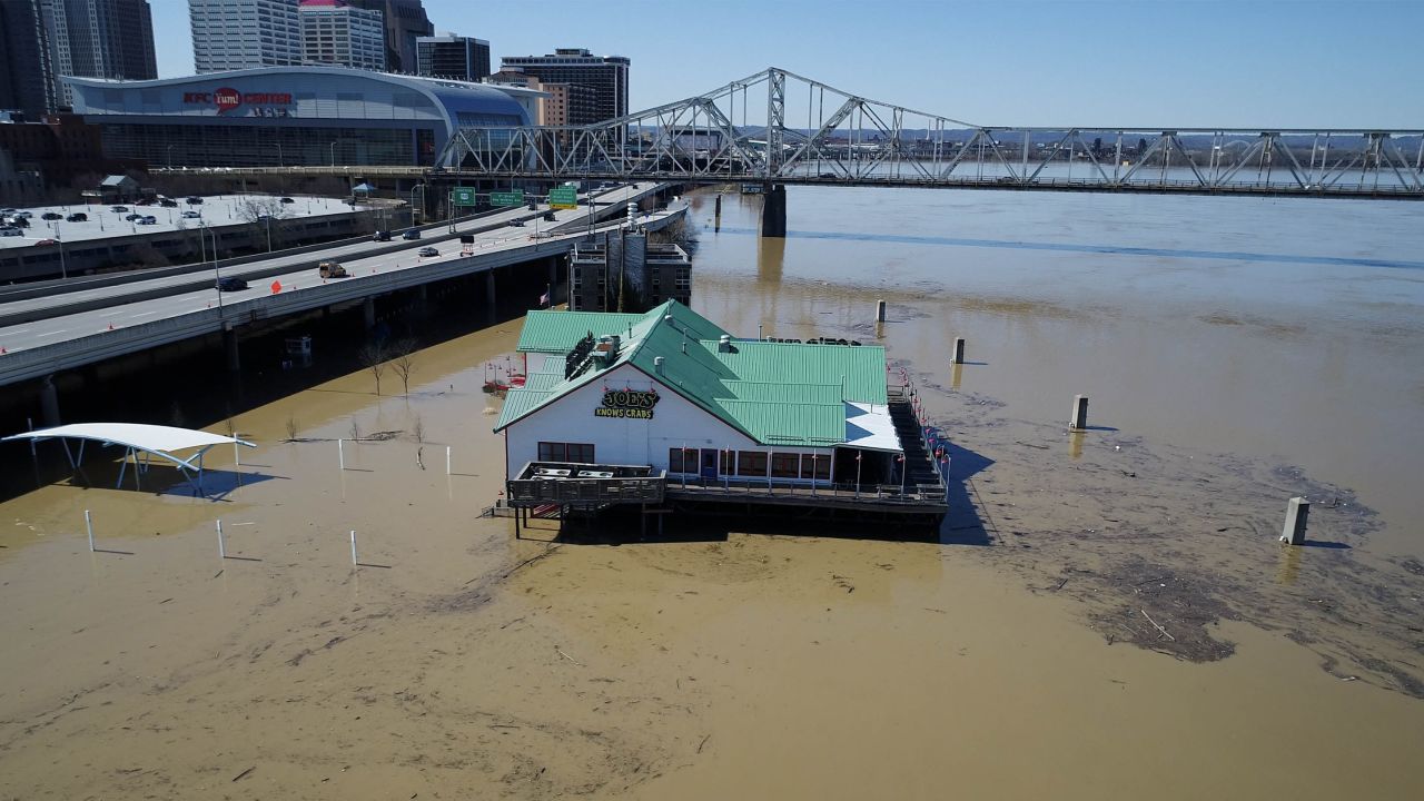 The Joe's Crab Shack in Louisville, Kentucky, sits surrounded by water along the Ohio River.