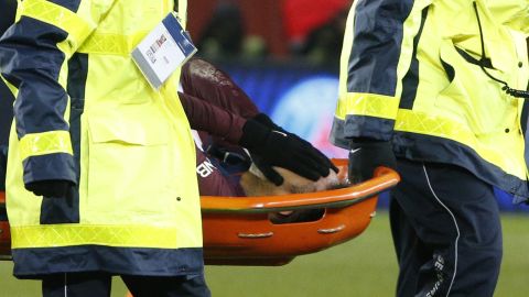 Neymar is stretchered off during PSG's game against Marseille on Sunday.