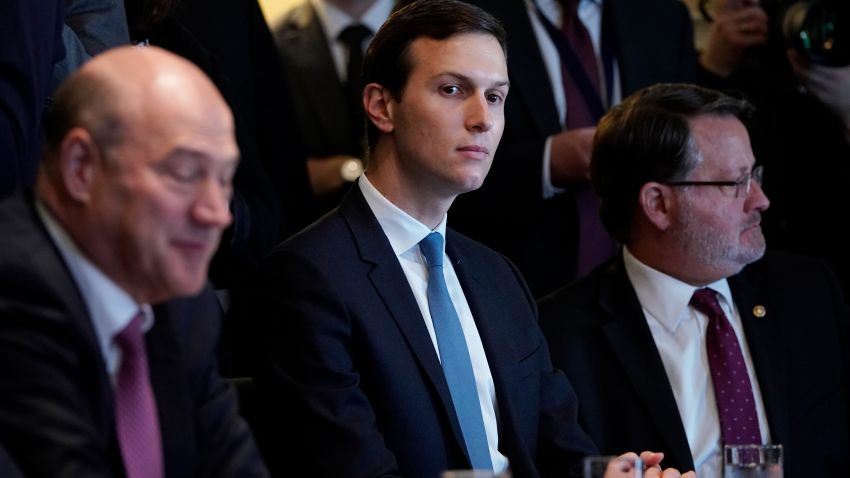 From left: Director of the National Economic Council Gary Cohn, Senior Advisor Jared Kushner, and Sentor Gary Peters, D-MI, take part in a meeting with US President Donald Trump and members of Congress on trade in the Cabinet Room of the White House on February 13, 2018 in Washington, DC. (MANDEL NGAN/AFP/Getty Images)