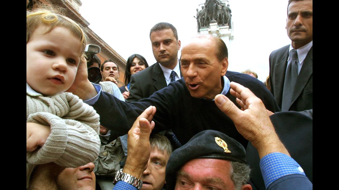 Berlusconi ran for prime minister in 1996, but lost to Romano Prodi. He ran again in 2001 and was elected. Here, he campaigns in Tatanto, Italy, on May 5, 2001.