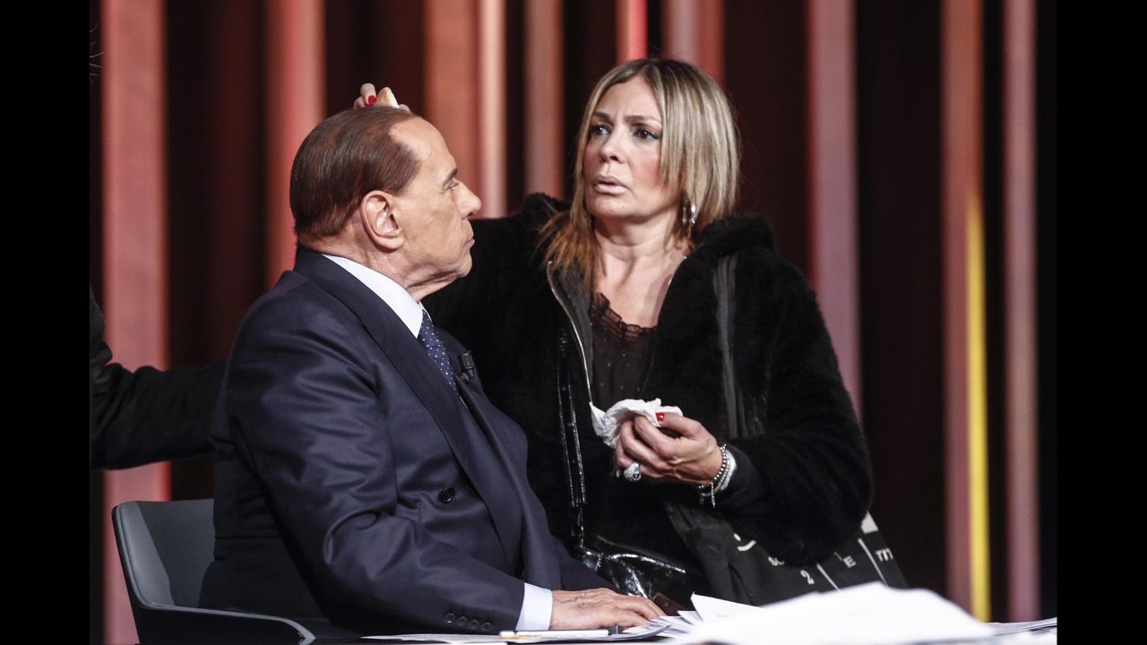 Berlusconi has makeup applied before a television appearance in February 2018.