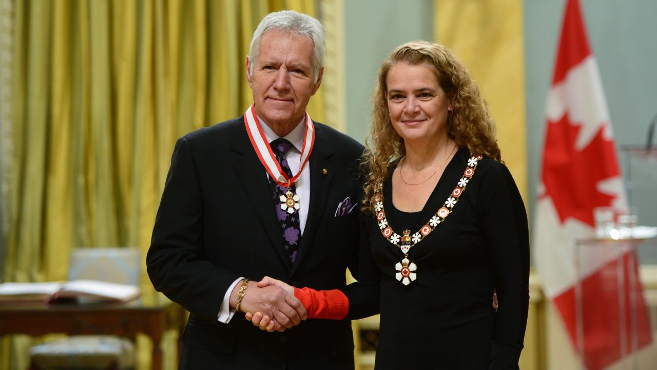Governor General of Canada Julie Payette presents the insignia of the Order of Canada to Trebek at Rideau Hall in Ottawa on November 17, 2017.