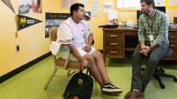 Gerardo Alejandrez (left) meets with counselor Erich Roberts at Oakland Technical High School on Sept. 26, 2017. Alejandrez used to throw chairs, hit his classmates and curse at his teachers before enrolling at Oakland Tech. "It was terrible times for me." (Heidi de Marco/KHN)