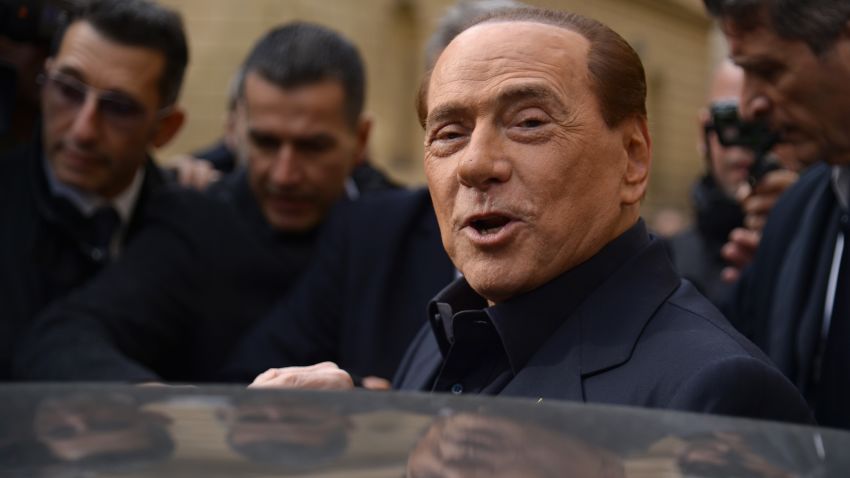 Italy's former Prime Minister Silvio Berlusconi leaves after voting for a referendum on constitutional reforms, on December 4, 2016 at a polling station in Rome. Italians began voting today in a constitutional referendum on which reformist Prime Minister Matteo Renzi has staked his future. Italy's has had 60 different governments since the constitution was approved in 1948. / AFP / Filippo MONTEFORTE        (Photo credit should read FILIPPO MONTEFORTE/AFP/Getty Images)