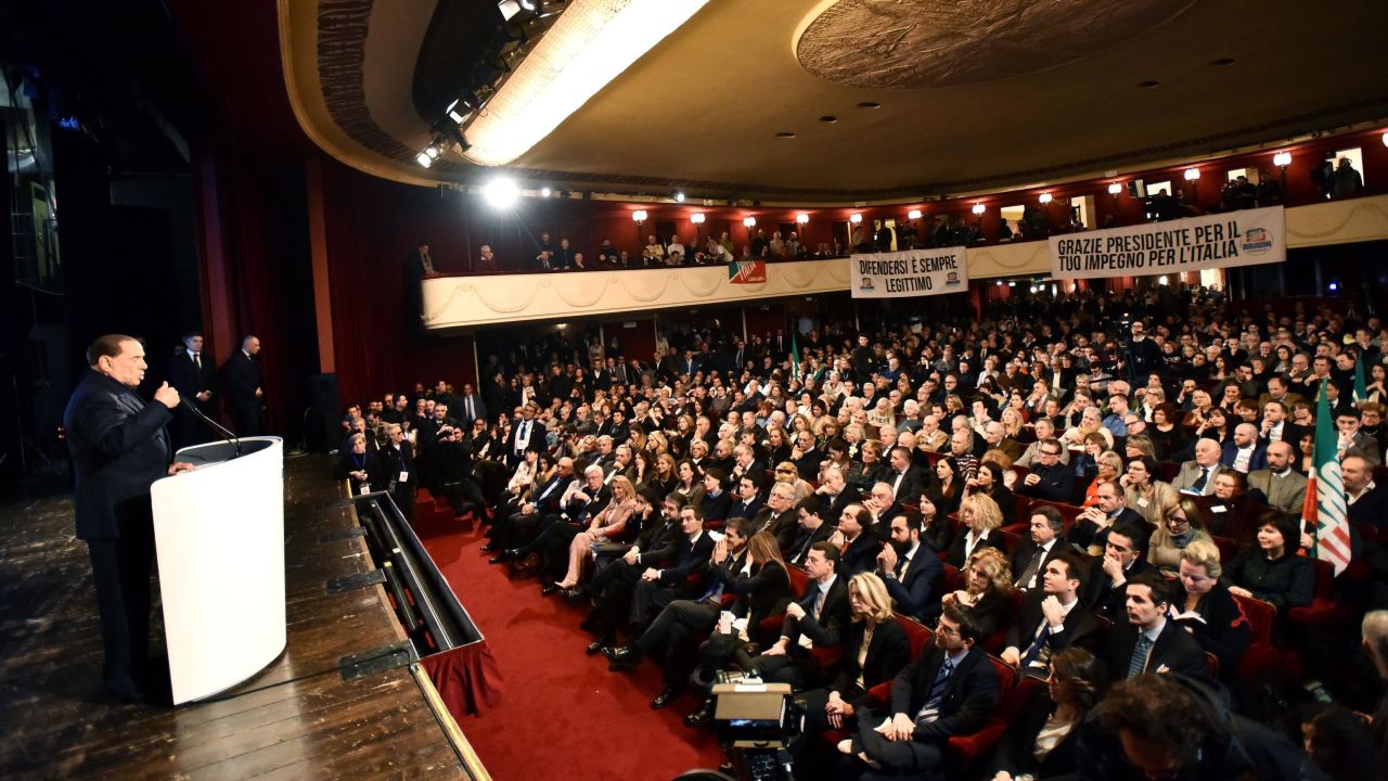 Berlusconi addresses a crowd in Milan on Sunday.