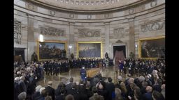 The body of Rev. Billy Graham, who died last week at age 99, lies in the Capitol Rotunda as President Donald Trump, officials and dignitaries pay tribute to America's most famous evangelist, Wednesday, Feb. 28, 2018, in Washington. The North Carolina-born farm boy became a media-savvy Southern Baptist minister and spiritual adviser to numerous presidents, reaching millions around with the world with his rallies — or what he called "crusades" — through his pioneering use of television. (AP Photo/J. Scott Applewhite)