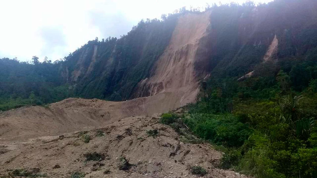 Debris from a massive landslide from Monday's earthquake covers an area in Tabubil township.