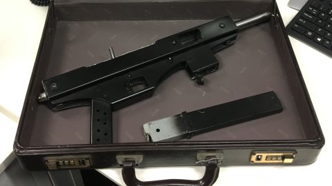 Surrendered items included this homemade machine gun in a suitcase.