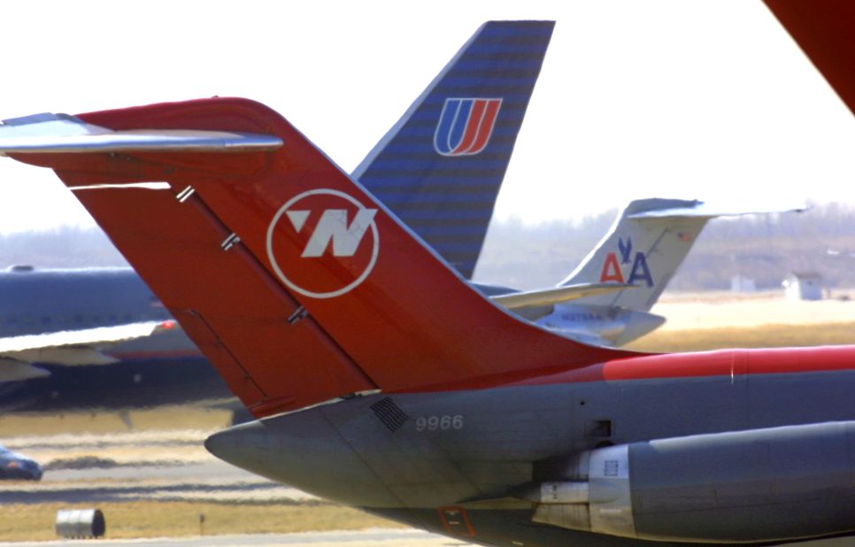 Before it was absorbed by Delta in 2008, Northwest Airlines used a logo designed by Landor Associates, the same studio that made the FedEx logo. The circle and the arrow create a compass pointing to the northwest; but the arrow, together with the "N," also creates a "W" that has part of its left leg removed. 