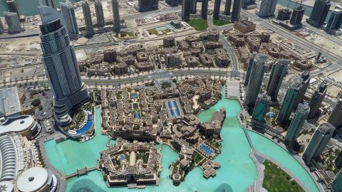 The Burj Khalifa overlooks the Dubai Fountain, Burj Park, Downtown Dubai and the Dubai Mall.