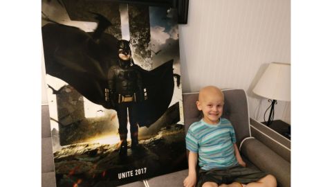 Five-year-old Simon Fuller, diagnosed with neuroblastoma, was featured as the Justice League's Batman.