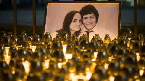 Light tributes placed during a silent protest in memory of murdered journalist Jan Kuciak and his fiancée Martina Kusnirova, seen in photo, in Bratislava, Slovakia, on February 28, 2018.