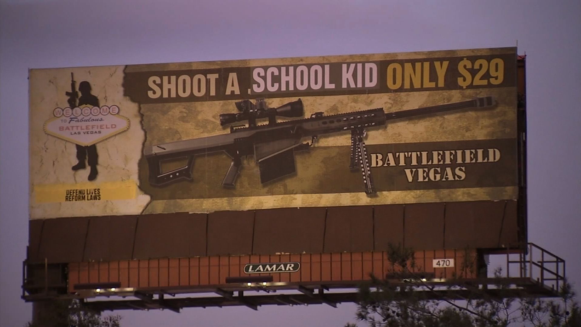 Irregularidades Imbécil En particular Shoot a school kid only $29,' says vandalized Vegas firing range billboard  | CNN
