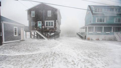 Coastal areas in New England are bracing for the high tide that is scheduled to be at it's highest as waves crash into homes in Scituate, Massachusetts on March 2, 2018. 
High winds, rain and flooding is taking place in Scituate and the surrounding coastal areas of Massachusetts as a storm known as a 'bomb cyclone' makes it way past the East Coast.  / AFP PHOTO / RYAN MCBRIDE        (Photo credit should read RYAN MCBRIDE/AFP/Getty Images)