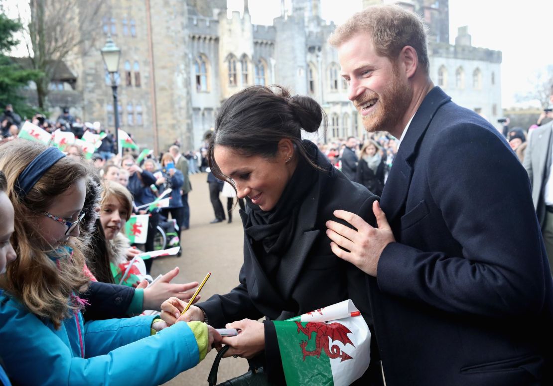 Markle was snapped writing a note for 10-year-old Caitlin Clarke during a trip to Cardiff in January.