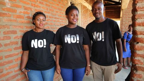 Instructors Simang'aliso Domoya, left, Patricia Mvula, center, and Dominc Luo, right, outside the Lilongwe classroom.
