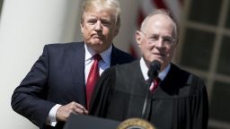 President Donald Trump listens while Supreme Court Justice Anthony Kennedy speaks during a ceremony in the Rose Garden of the White House April 10, 2017 in Washington, DC. 