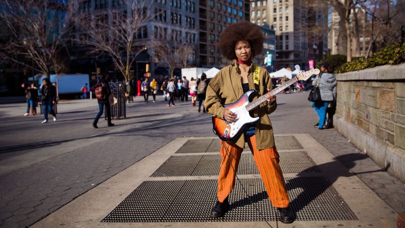 <strong>New York City: </strong>"Looking like a female Jimi Hendrix, Mareko, who is Filipina and African-American, was attracting a lot of attention in Union Square. She got started at age 13 when her cousin was deported to the Philippines and left a basement filled with musical instruments. She is the rare street musician who doesn't ask for money, but just wants to rehearse in front of people to build up her confidence."