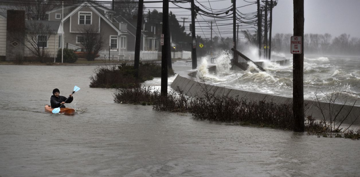 Daniel Cunningham, 22, dodges waves in a kayak in Quincy on March 2.