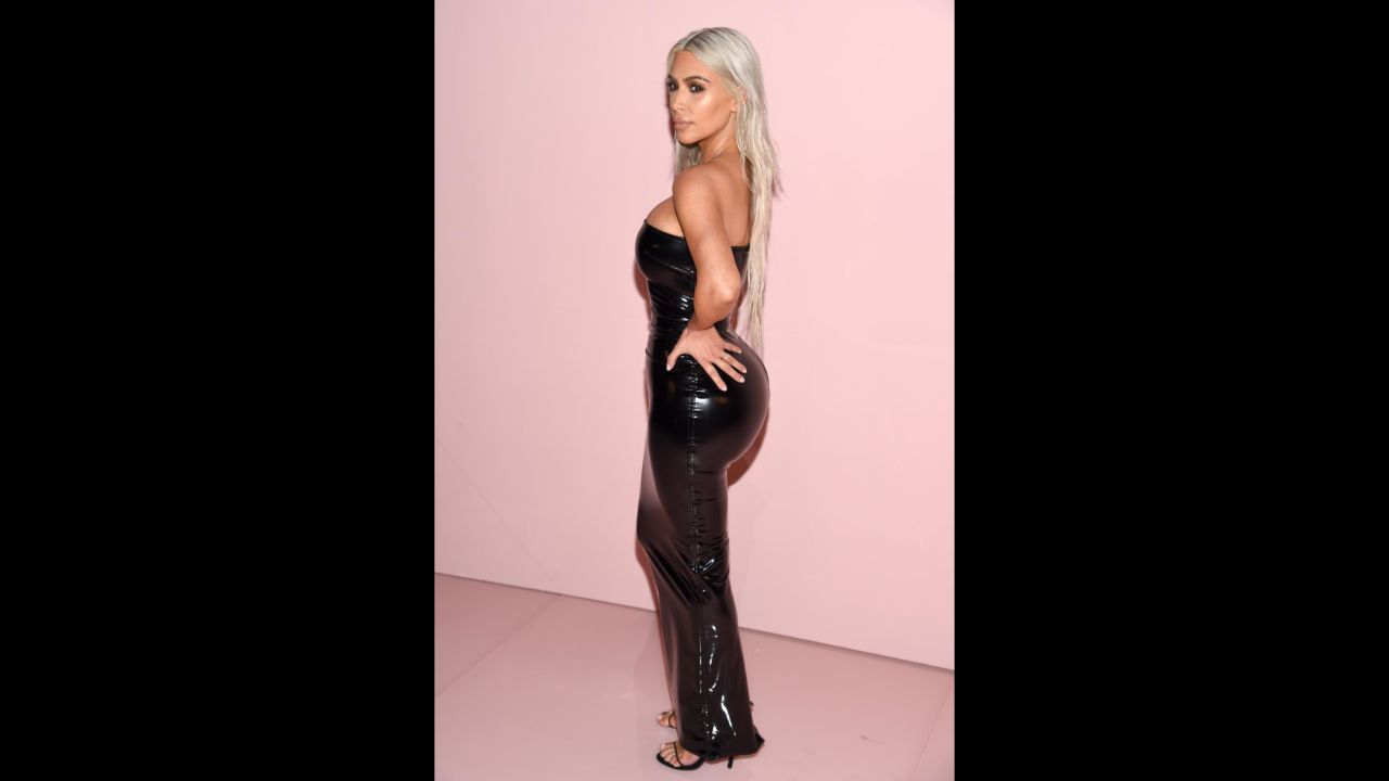 Reality star Kim Kardashian, in 2017, who often poses in a way to showcase her posterior. The term "<a href="https://www.cnn.com/2015/04/21/entertainment/kylie-jenner-lips-odd-beauty-trends-feat/index.html">belfie</a>" -- a butt selfie -- was reportedly coined by Kardashian herself.