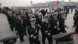 Military delegates arrive for the opening session of the National People's Congress, China's legislature, in Beijing's Great Hall of the People on March 5, 2018.
China's rubber-stamp parliament opens a major annual session set to expand President Xi Jinping's considerable power and clear him a path towards lifelong rule. / AFP PHOTO / NICOLAS ASFOURI        (Photo credit should read NICOLAS ASFOURI/AFP/Getty Images)