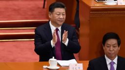 Chinese President Xi Jinping applauds during the opening session of the National People's Congress, China's legislature, at the Great Hall of the People in Beijing on March 5, 2018. / AFP PHOTO / WANG ZHAO        (Photo credit should read WANG ZHAO/AFP/Getty Images)