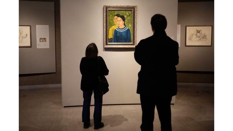 <strong>Boston, Massachusetts:</strong> Visitors examine the 1928 Frida Kahlo painting "Dos Mujeres (Salvadora y Herminia)," at the Museum of Fine Arts, one of the top museums in the nation.