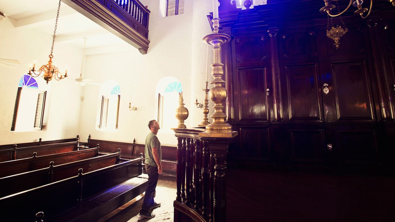 <strong>A deeper dive into Curaçao: </strong>Consecrated in 1732, Mikvé Israel-Emanuel Synagogue is walking distance from Avila Beach. The synagogue claims to be the oldest in continuous use in the Western Hemisphere and features stained-glass windows and ornate menorahs.