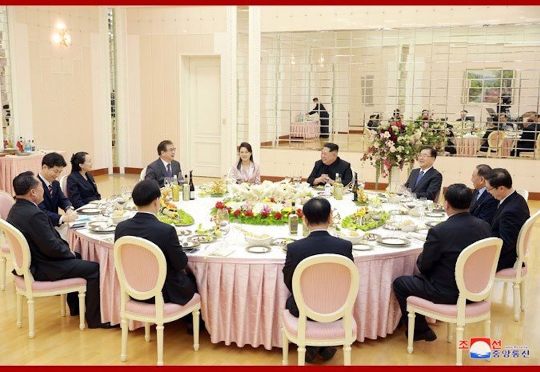 North Korean leader Kim Jong Un (center right) sits with a visiting South Korean delegation in Pyongyang and other high-level North Koreans. 