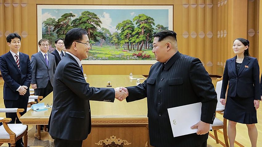 PYONGYANG, NORTH KOREA - MARCH 05: In this handout image provided by the South Korean Presidential Blue House, Chung Eui-Yong (L), head of the presidential National Security Office shakes hands with North Korean leader Kim Jong-Un (R) during their meeting on March 5, 2018 in Pyongyang, North Korea. South Korean envoys are to visit North Korea for two days to discuss issues. (Photo by South Korean Presidential Blue House via Getty Images)