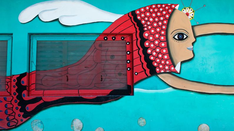 <strong>Island as museum:</strong> Street art is a popular form of self-expression on Holbox, with many stores and restaurants covered in original murals.