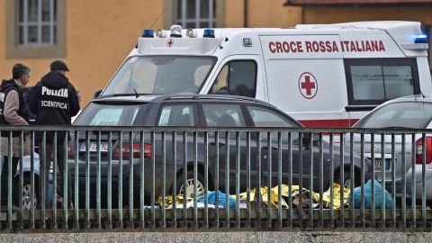 Police and rescuers at the site of the shooting in Florence on Monday.