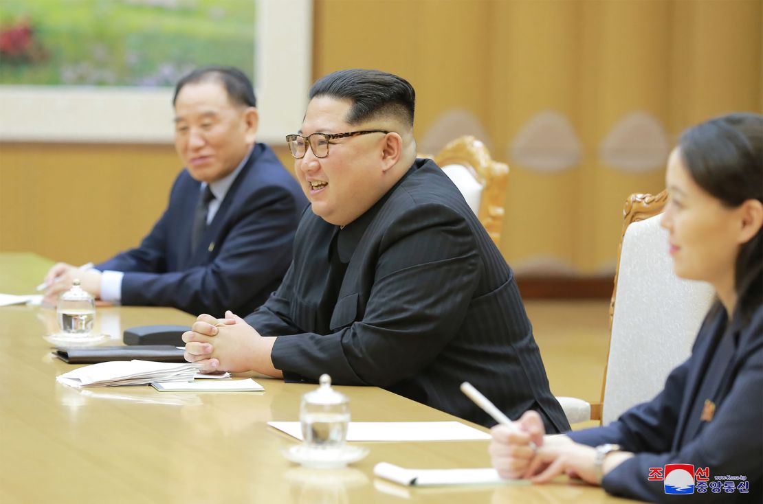 This picture  released from North Korea's official Korean Central News Agency (KCNA) on Tuesday shows North Korean leader Kim Jong Un (center) meeting with the South Korean delegation. To Kim's left is his sister and confidante, Kim Yo Jong.