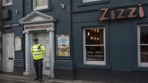 A police officer stands outside Zizzi restaurant in Salisbury, close to where the Skripals were found.  