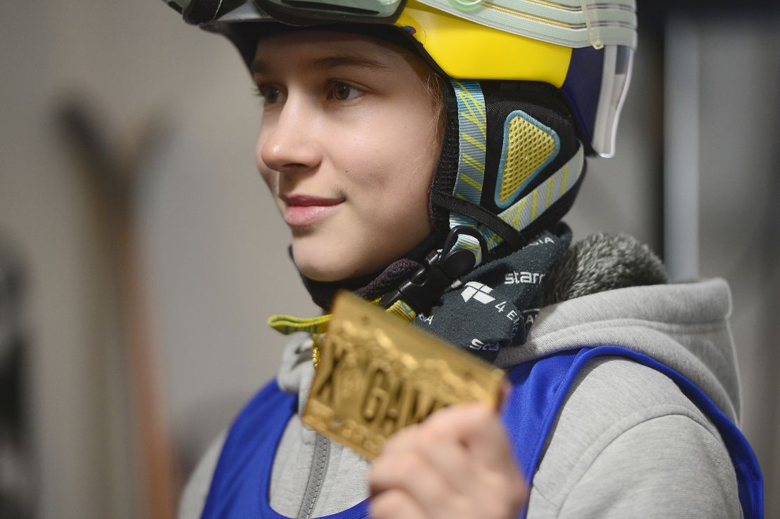 Kelly Sildaru holds aloft her X Games gold medal at Buttermilk Mountain in Aspen, aged 13.