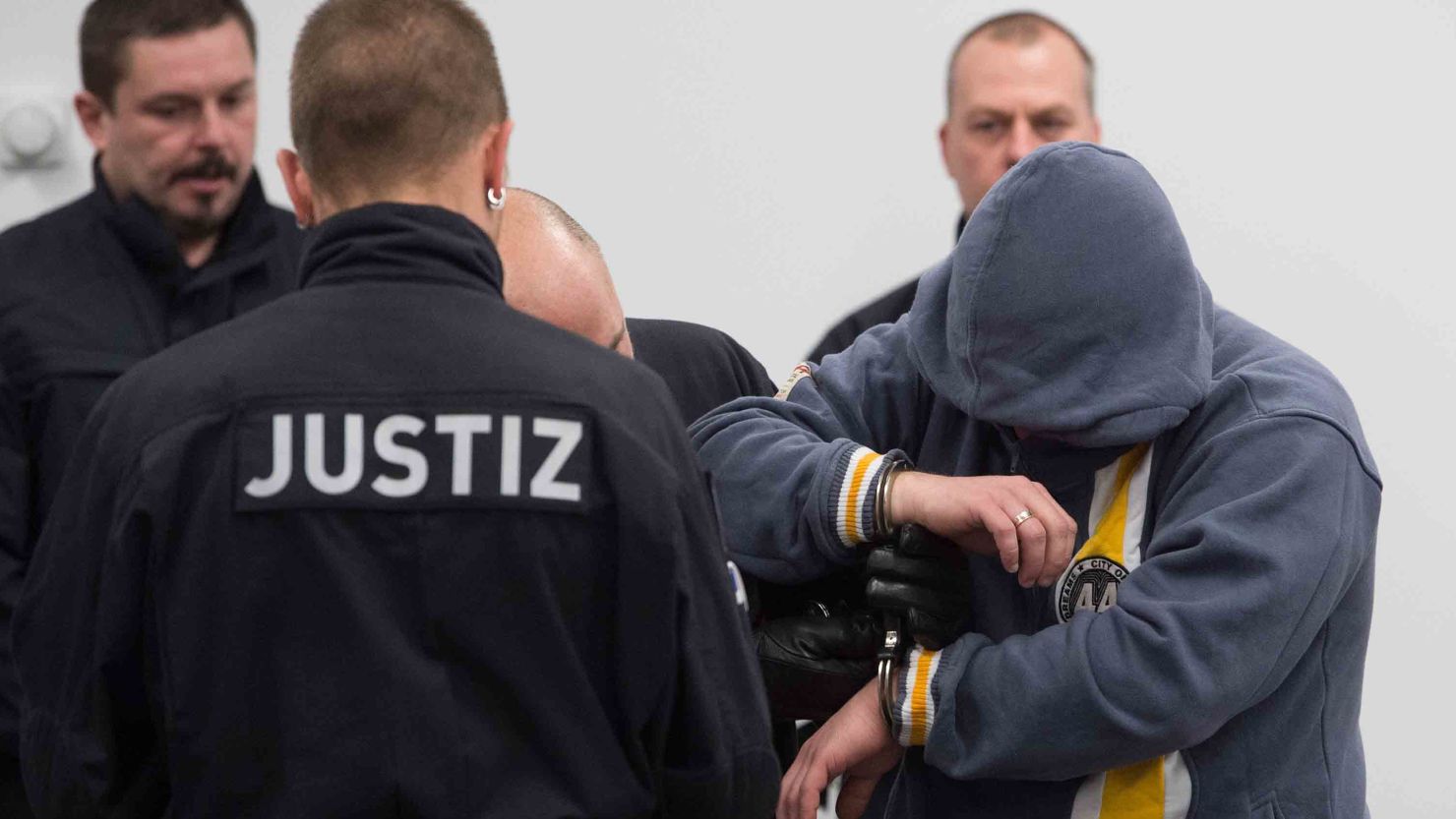 One of the defendants arrives for the start of the trial in Dresden last March.