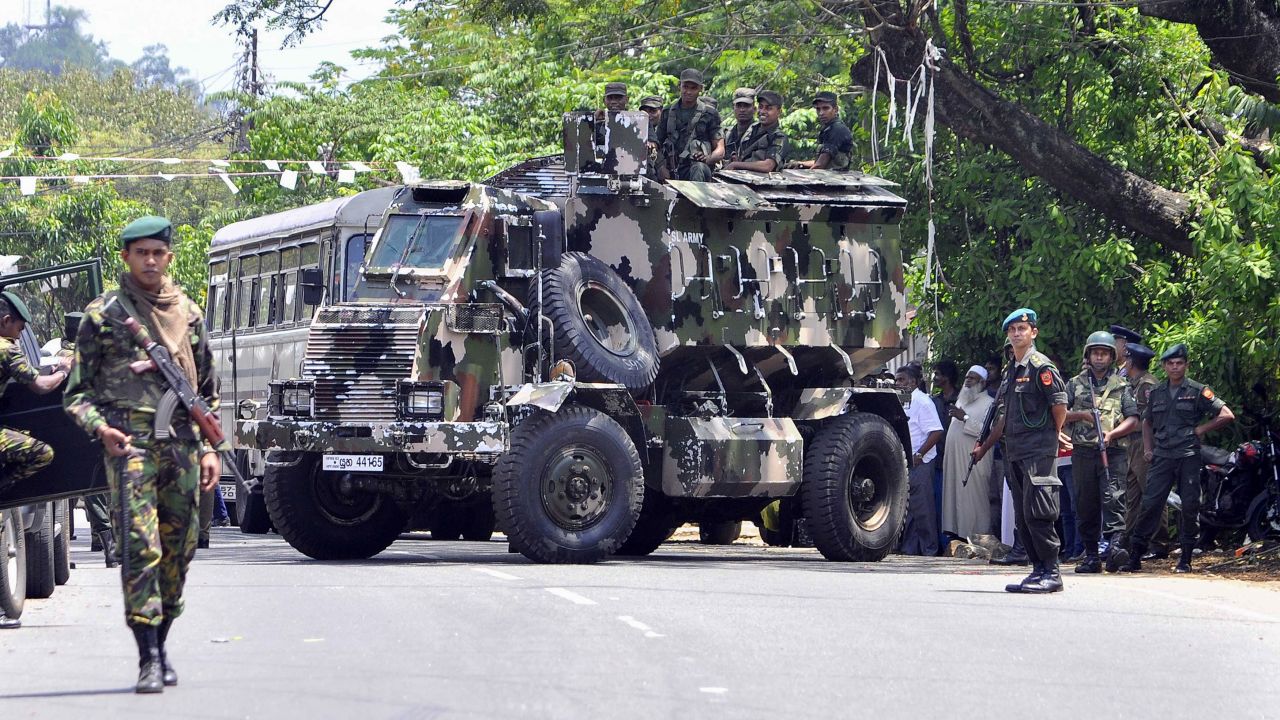 Sri Lankan police commandos on the streets of Pallekele, a suburb of Kandy, on March 6, 2018.