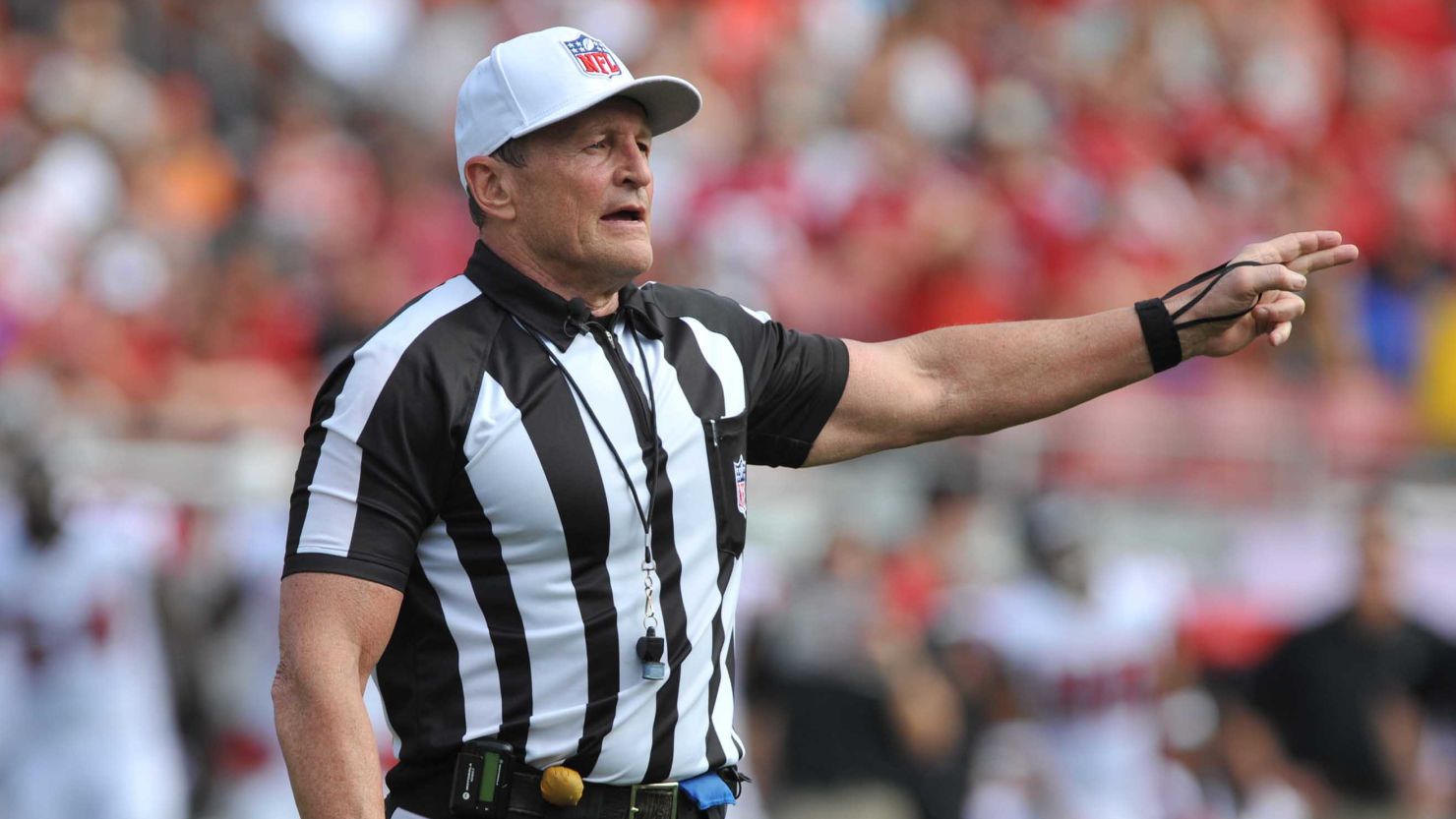 Ed Hochuli is known for his muscular physique and explanation of penalties.