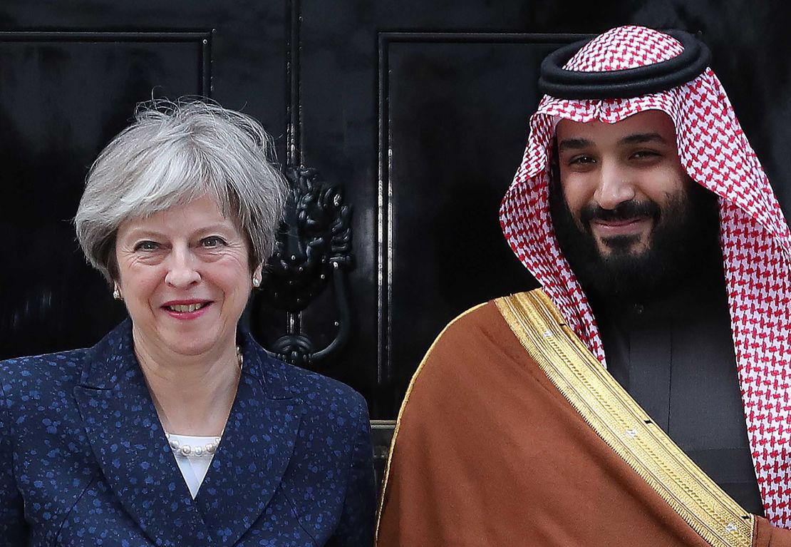 Britain's Prime Minister Theresa May greets Saudi Arabia's Crown Prince Mohammed bin Salman  outside 10 Downing Street on March 7, 2018.