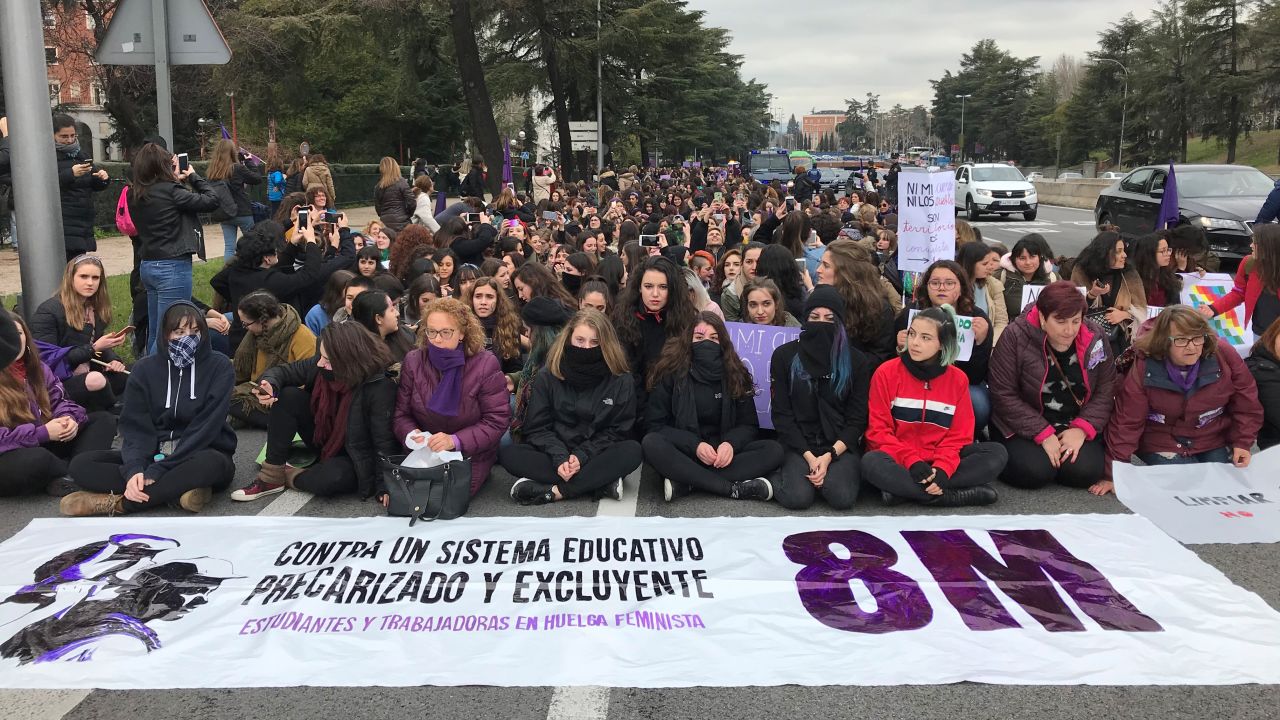 Students in Madrid partially blocked a central road in the city's university district Thursday.