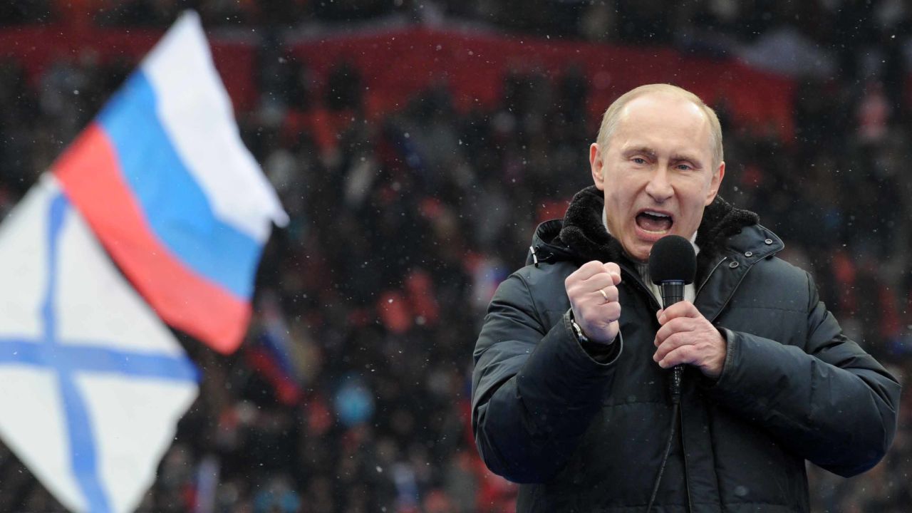 Russian Presidential candidate, Prime Minister Vladimir Putin delivers a speech during a rally of his supporters at the Luzhniki stadium in Moscow on February 23, 2012. Prime Minister Vladimir Putin on Thursday vowed he would not allow foreign powers to interfere in Russia's internal affairs and predicted victory in an ongoing battle for its future. "We will not allow anyone interfere in our internal affairs," Putin said in a speech to more than 100,000 people packed into the stadium and its grounds at Moscow's Luzhniki stadium ahead of March 4 presidential elections.
. AFP PHOTO/AFP PHOTO / YURI KADOBNOV        (Photo credit should read YURI KADOBNOV/AFP/Getty Images)