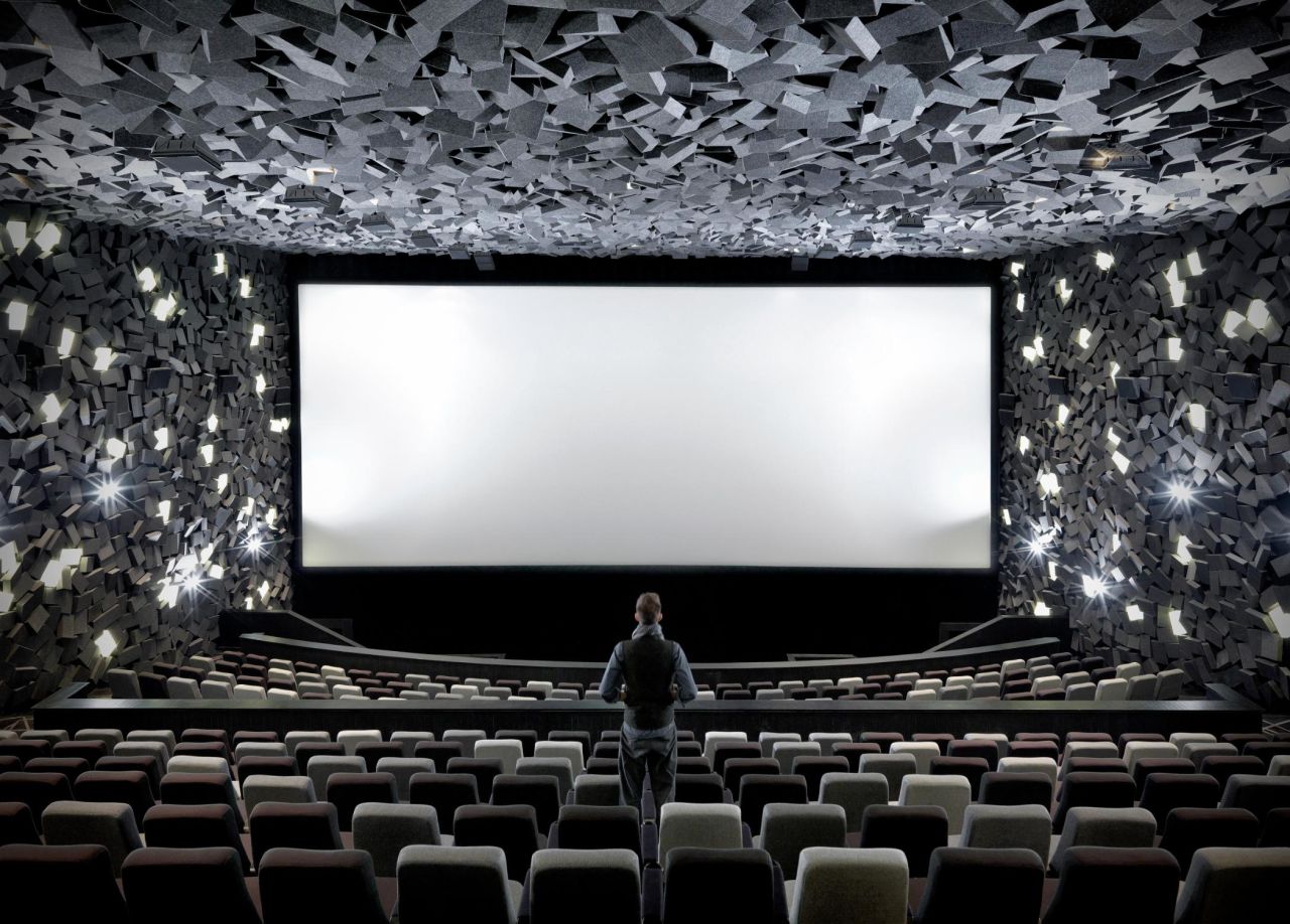 The Wuhan Wushang Mall International Cinema was designed to look like the aftermath of a high-budget Hollywood explosion. Hundreds of acoustic panels have been scattered across the auditoriums' walls, appearing like piles of brick and rubble.