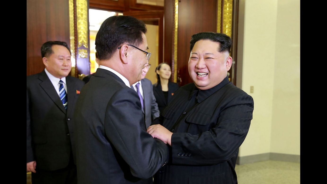 North Korean leader Kim Jong Un, right, shakes hands with South Korean envoy Chung Eui-yong in this photo released Tuesday, March 6, by North Korea's state-run news agency. <a href="https://www.cnn.com/2018/03/05/asia/north-korea-south-korea-talks-intl/index.html" target="_blank">In an unprecedented meeting,</a> Kim met with a South Korean delegation and said he wants to "write a new history of national reunification." It's believed to be the first time Kim has spoken face-to-face with officials from the South since he took power in 2011. 