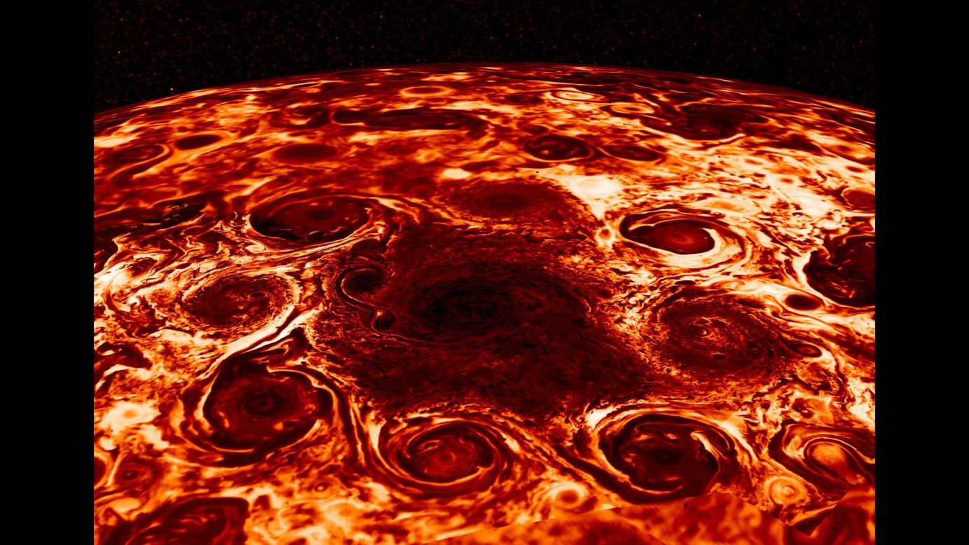 In this composite image, derived from an infrared instrument aboard NASA's Juno spacecraft, a central cyclone is surrounded by eight other cyclones at Jupiter's north pole. <a href="https://www.cnn.com/2018/03/07/world/nasa-jupiter-inner-secrets-intl/index.html" target="_blank">New data collected by Juno</a> has revealed some of the planet's swirling inner mysteries.