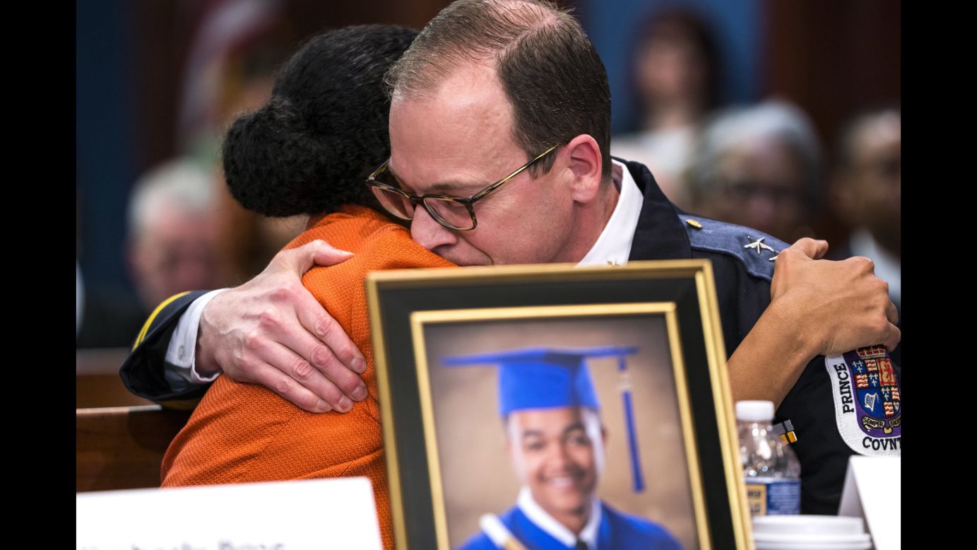 Kim Bose hugs Hank Stawinski, the police chief of Prince George's County, Maryland, during a meeting at the US Capitol about gun violence on Wednesday, March 7. Bose's 20-year-old son, Joseph, was killed by gun violence in 2015.