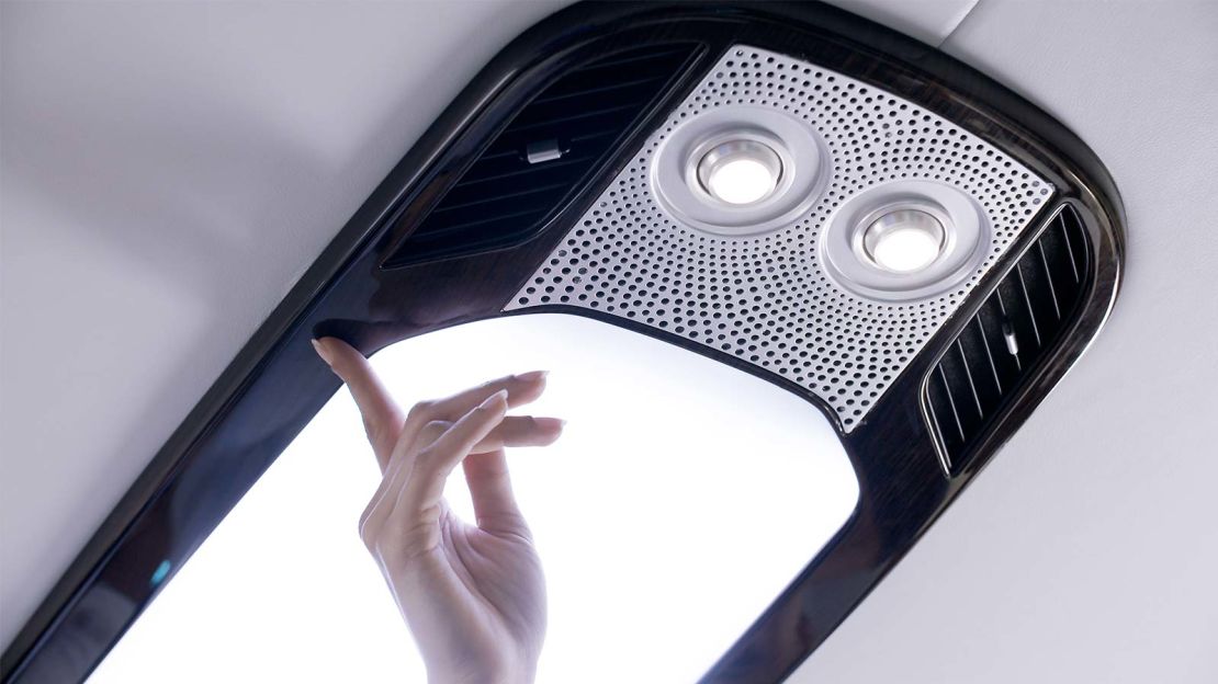 Demonstrating the soft-touch reading lights on a Bell 525 Relentless.